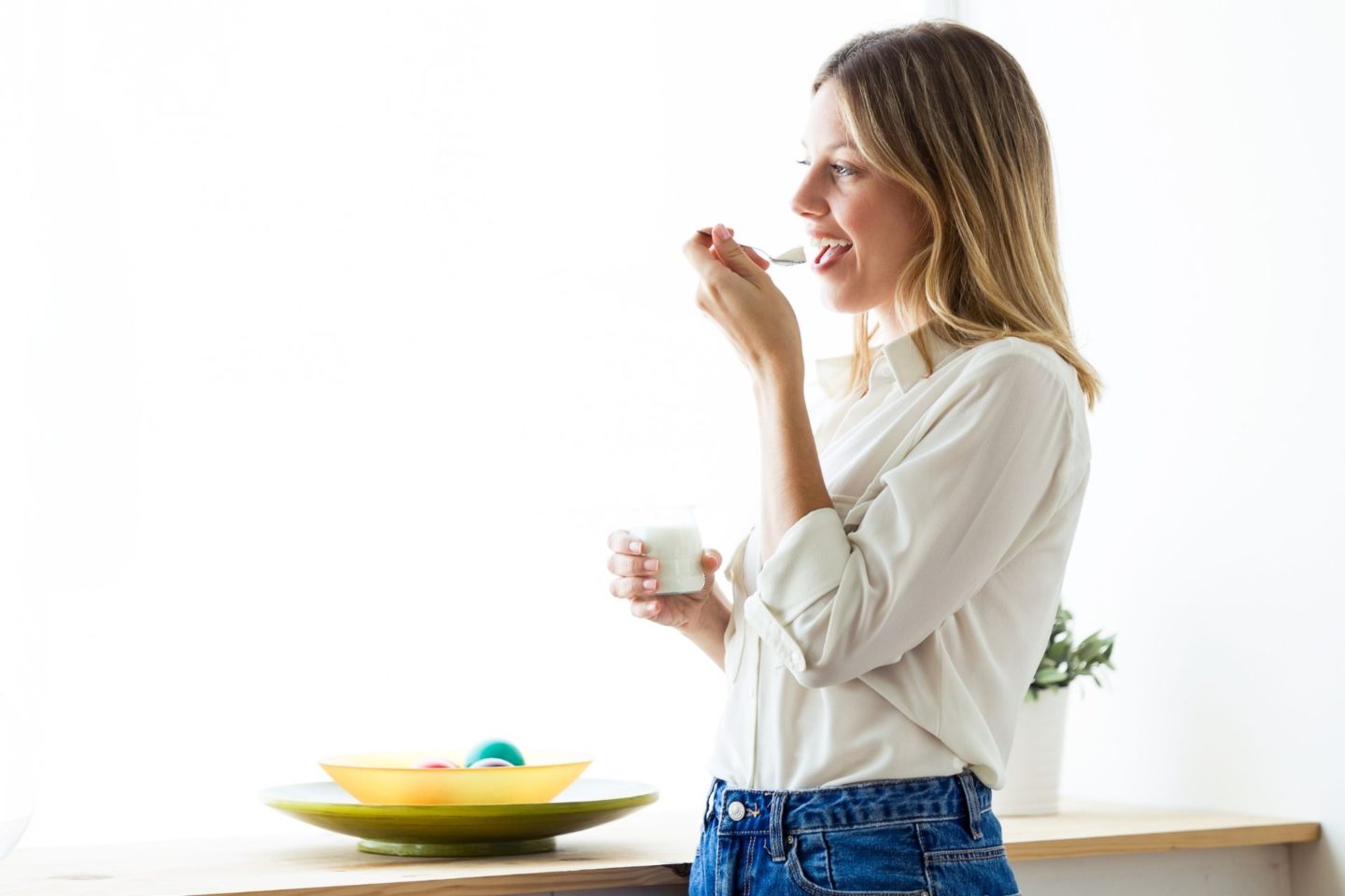 A woman eating healthy food.